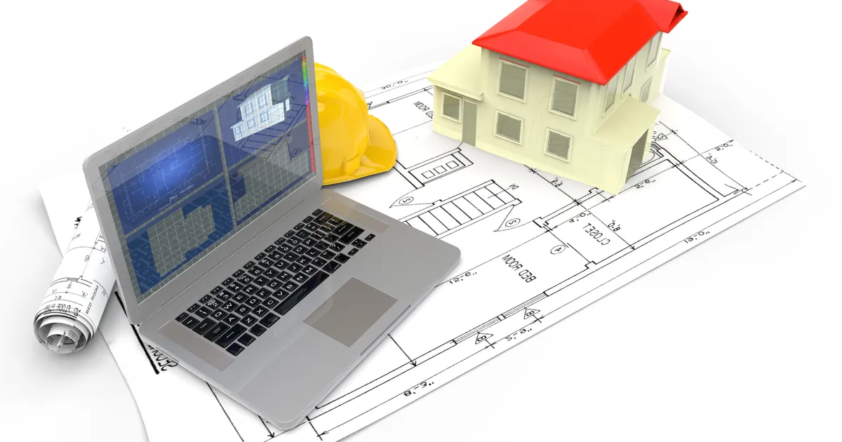 A construction professional reviewing project documents and plans